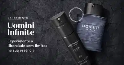 Imagem de um frasco preto com letras verde-oliva e vidro verde com tampa preta e letras brancas de itens da marca Uomini Infinite em fundo escuro.