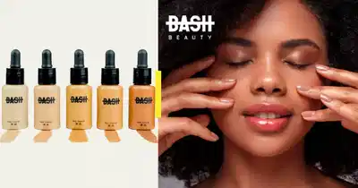 A imagem mostra sete pequenos frascos de base líquida com diferentes tons de pele, ao lado de uma foto de uma mulher negra aplicando maquiagem no rosto com as mãos.
