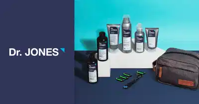 Banner publicitário da marca Dr. Jones, exibindo produtos de cuidados pessoais e uma bolsa.
