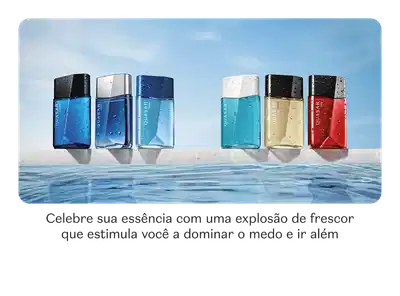 Seis frascos de desodorante colônia em diferentes cores e linhas de Quasar, dispostos sobre uma superfície refletiva com água. O texto diz que a essência estimula a dominação do medo e a liberdade de ir além.