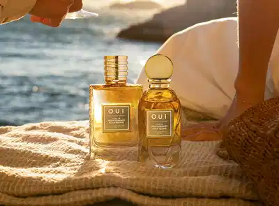 Dois frascos L’Or de Méditerranée Eau De Parfum Pour Femme e L’Or de Méditerranée Eau De Parfum Pour Homme.