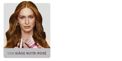 O banner mostra uma mulher com cabelos ruivos e longos, usando um vestido rosa, segurando um produto da marca USA Stage Nutri Rosé.