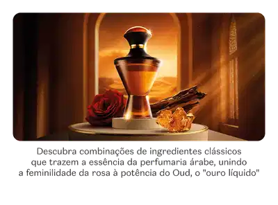 Imagem do frasco do Eau de Parfum Hadiya com notas de rosa e Oud. O frasco está em um pedestal, com rosa e especiarias em um cenário desértico.