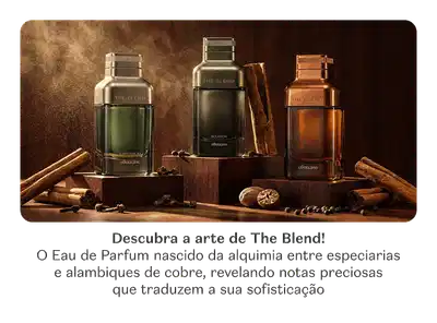 O banner apresenta uma coleção de produtos da marca The Blend, incluindo Desodorante Colônia, Loção Corporal e Óleo Corporal, em embalagens elegantes e sofisticadas.