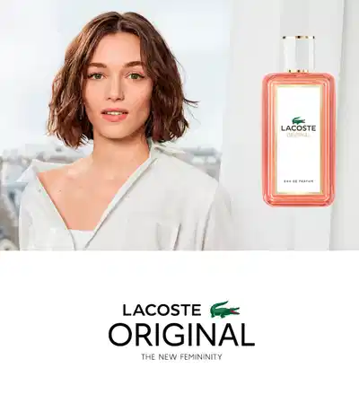 Eau de Parfum Lacoste Original em frasco retangular coral com tampa transparente.