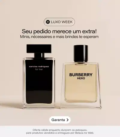 Promoção Luxo Week com dois frascos de Eau de Parfum: Narciso Rodriguez for Her em frasco preto e Burberry Hero em frasco transparente com líquido bege. Texto: "Seu pedido merece um extra! Minis, necessários e mais brindes te esperam". Botão "Garantia" no canto superior direito. Rodapé indica: Vendido por O Boticário e entrega por Beleza na Web.