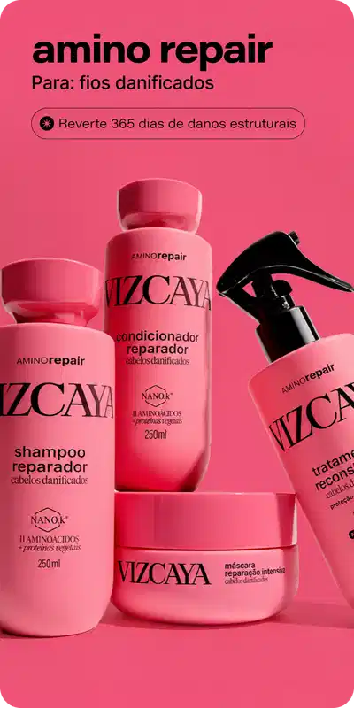 Linha amino repair Vizcaya para cabelos danificados. Composição: shampoo reparador 250ml com 11 aminoácidos e proteínas vegetais, condicionador reparador 250ml com 11 aminoácidos e proteínas vegetais, máscara reparação intensiva e spray reparador. Todos os produtos apresentam a marca Vizcaya em rosa vibrante. Benefício: reverte 365 dias de danos estruturais. Fundo rosa intenso.