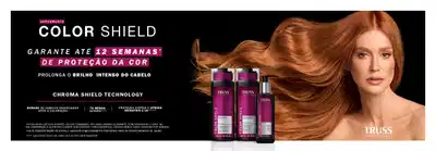 Lançamento Color Shield Truss Professional. Garante até 12 semanas de proteção da cor. Prolonga o brilho intenso do cabelo. Chroma Shield Technology repara os cabelos danificados 2x menos quebra e proteção contra o stress oxidativo e UV. Imagem de mulher com cabelo castanho avermelhado volumoso. Três produtos da linha Color Shield em frascos roxos: shampoo, condicionador e leave-in, com capacidades de 300 mililitros para os dois primeiros e tamanho menor para o terceiro. Uso específico de leave-in e active hair booster. Alta concentração de ativos e agentes condicionantes essenciais para os procedimentos de salão.