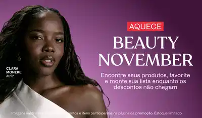 Mulher negra de cabelos longos e pretos, usando roupa branca, comunicando o "Aquece Beauty November" sobre fundo roxo.
