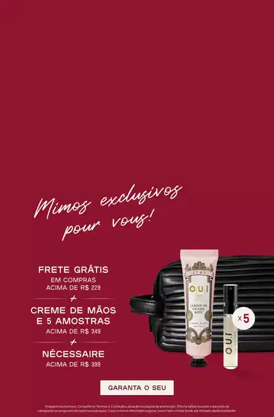 Fundo vermelho intenso com texto em branco à esquerda dizendo "Mimos exclusivos pour vous" e botão "GARANTA O SEU". No centro, informações sobre oferta: "FRETE GRÁTIS EM COMPRAS ACIMA DE R$299 + CREME DE MÃOS E 5 AMOSTRAS ACIMA DE R$349 + NECESSAIRE ACIMA DE R$399". À direita, produtos exibidos: necessaire preta com textura ondulada, frasco de