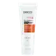 Tubo branco da linha Dercos Technique da Vichy, com rótulo laranja destacando o "Kera-Solutions" e "10.7% Pro Keratin Complex". Produto de proteção térmica até 230°C, indicado como leave-in renovador de pontas.
