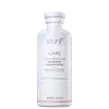 Frasco branco da linha Care da Keune, contendo Shampoo Color Brillianz para proteção de cabelos coloridos. Rótulo com nome do produto e informações sobre sua função de proteger a cor dos cabelos.