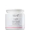 Frasco branco da linha Keune Care, contendo máscara para cabelos coloridos, com rótulo destacando "Color Brillianz Mask" e informações sobre a proteção da cor dos cabelos.