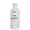 Frasco branco de condicionador Keune Care Derma Sensitive, com 250 ml de capacidade. O rótulo apresenta o nome da marca e do produto, bem como informações sobre sua função de acalmar o couro cabeludo sensível.