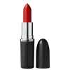 A imagem mostra um batom tipo bala, vermelho, com a tampa ao lado. A embalagem é preta e prata com o logo da marca em preto.