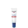 Bisnaga branca com rótulo da marca Eucerin, contendo texto "Aquaphor" e "Reparação de Lábios S.O.S." em azul e vermelho, com informações sobre o produto de cuidados para a pele.