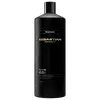 Frasco preto de shampoo da marca Sebastian Professional, com rótulo em dourado e texto "Dark Oil Silky Shine Shampoo". O produto é apresentado em embalagem cilíndrica com tampa preta, em fundo escuro.