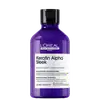 Frasco de shampoo profissional da marca L'Oréal Professionnel, com design em tons de roxo e preto, rotulado como "Keratin Alpha Sleek" com informações sobre seus benefícios para cabelos.