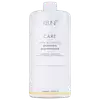Frasco branco da linha Keune Care Vital Nutrition, contendo shampoo para cabelos secos e danificados. Rótulo com nome do produto e informações sobre o uso.