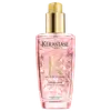 Frasco rosa com tampa dourada contendo o produto "Elixir Ultime L'Huile Rose" da marca Kérastase Paris, um óleo capilar de tratamento.