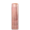 Frasco rosa de shampoo da marca Braé, chamado "Revival", com informações sobre reconstrução imediata para cabelos extremamente danificados.