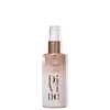 Frasco de serum da marca Braé, com embalagem de vidro e bomba de pulverização, em tons de rosa e bronze, com o nome "Divine" impresso em destaque.