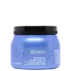 Frasco de tratamento capilar Redken Extreme Strength Builder Plus, com 500 ml de capacidade, em embalagem de plástico azul e preto, com rótulo destacando o nome do produto e a marca Redken.