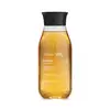 Frasco transparente com líquido amarelo, tampa preta e letras brancas e douradas contendo 250ml de sabonete líquido perfumado Nativa SPA Quinoa.