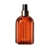 Vidro laranja de tampa spray preta com detalhe e letras douradas contendo 250ml de aromatizador de ambientes Casa 214 Vanilla Sublime.