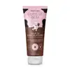 Frasco de loção hidratante corporal da marca Cuide-se Bem Deleite Chocolatudo, com bisnaga rosa e marrom, apresentando ilustração de vaca no rótulo.