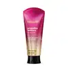 Bisnaga de creme corporal perfumado da marca Nativa SPA Orquídea Lumière, com cores em degradê de rosa e dourado, com tampa preta e informações sobre o produto escritas em branco no rótulo.