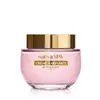 Frasco de vidro de creme perfumado da marca Nativa SPA Ameixa Negra na cor rosada, com tampa dourada e embalagem rosa claro, contendo texto em dourado escrito Crème Parfumée no rótulo.