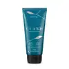 Bisnaga de creme pré e pós-barba da marca Clash, em tom azul-esverdeado com tampa preta, com texto em branco destacando o nome do produto.