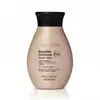 Frasco de item de cuidados com o corpo da marca Nativa SPA Baunilha Exclusive, com embalagem rosa clara e tampa preta, contendo texto "Baunilha Exclusive" e "Óleo Glorioso Hidratante Desodorante Corporal" também em preto.