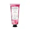 O produto apresentado é um creme perfumado para as mãos da linha Instance Rosa Absoluta. A embalagem é um tubo plástico rosa com rótulo branco que destaca algumas características do produto, como conter glicerina vegetal, ser hidratante e aroma de rosa.