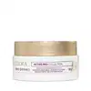 O produto apresentado é um creme de contorno facial da linha Neo Dermo da marca Eudora. A embalagem é um pote branco com uma tampa dourada
.
