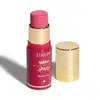 O produto apresentado é um blush stick da linha Niina Secrets da marca Eudora. Possui uma embalagem rosa com detalhes dourados, incluindo o nome da marca e da linha. O produto tem formato cilíndrico e tampa dourada.