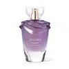 Frasco de  Eudora Magnific Violet Dahlia, com formato arredondado e tampa dourada, em embalagem de vidro transparente com tonalidade roxa.