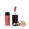 O produto de beleza Eudora Make apresenta um batom líquido rosa em embalagem cilíndrica, acompanhado de um espelho compacto dourado em formato de coração.