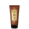 Creme hidratante desodorante Eudora Instance Âmbar Precioso, embalagem tubo marrom com detalhes dourados, 150ml. Produto concentrado ultra perfumado com hidratação profunda e pele desodorizada.