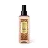 Frasco transparente com rótulo marrom e dourado da marca Instance, contendo item de perfumaria em body splash com fragrância de âmbar precioso, apresentado em posição frontal.