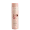 Frasco rosa claro de shampoo da marca Braé, com rótulo em vermelho destacando o nome "Essential" e informações sobre o produto, como "Intense Repair Hyaluronic Acid".