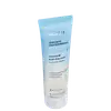 Bisnaga azul com tampa branca e letras prateadas e pretas contendo 50ml de creme hidratante facial Skin.q Toda Regenerada da marca Quem Disse, Berenice?.