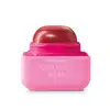 Produto de beleza em embalagem plástica rosa e vermelha. Rótulo na parte inferior rosa com o texto "OBOTICÁRIO CUIDE-SE BEM" em letras brancas.