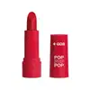 Imagem de um batom semi matte na cor Vermelho Icônico em embalagem rosa vibrante e tampa na mesma tonalidade com letras brancas. O produto faz parte da marca  POP Quem Disse, Berenice?