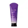 Bisnaga com degradê de roxo e branco, tampa preta e letras douradas e brancas contendo 200ml de loção noturna corporal Nativa SPA Orquídea Noire.