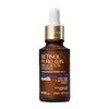 Vidro marrom com tampa dourada, conta-gotas branco, letras bege e detalhe azul escuro contendo 30ml de sérum facial de alta potência Botik Retinol Puro.