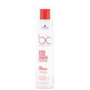 Frasco cilíndrico branco e vermelho.