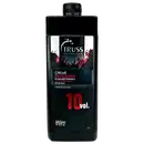 Frasco preto da marca Truss Professional contendo Creme Developer, fórmula estabilizada com 10 volumes, embalagem de 950ml, com rótulo em preto e vermelho destacando a informação de "Creme Developer".