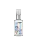 A imagem mostra o Óleo Capilar Cadiveu Professional Final Style Supreme Oil 30ml, uma embalagem prateada fosca com detalhes holográficos e texto na cor preta. Traz as informações: brilho e maciez instantânea, proteção térmica e fórmula leve.